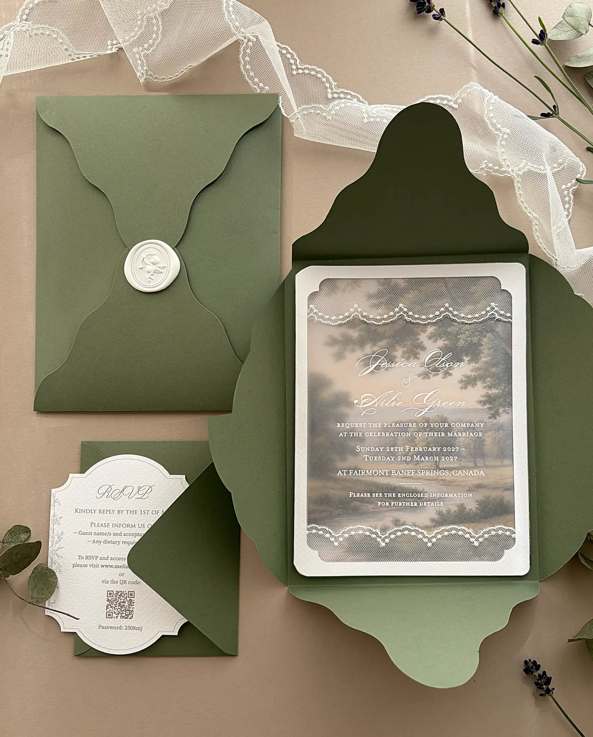 Open olive green four-petal folder with a lace-trimmed vellum invitation, beside an olive envelope sealed with white wax and a scalloped RSVP card